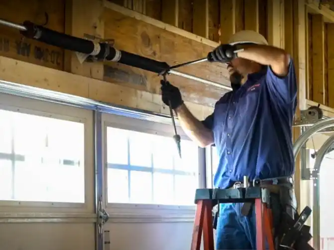 expert repairing a garage door